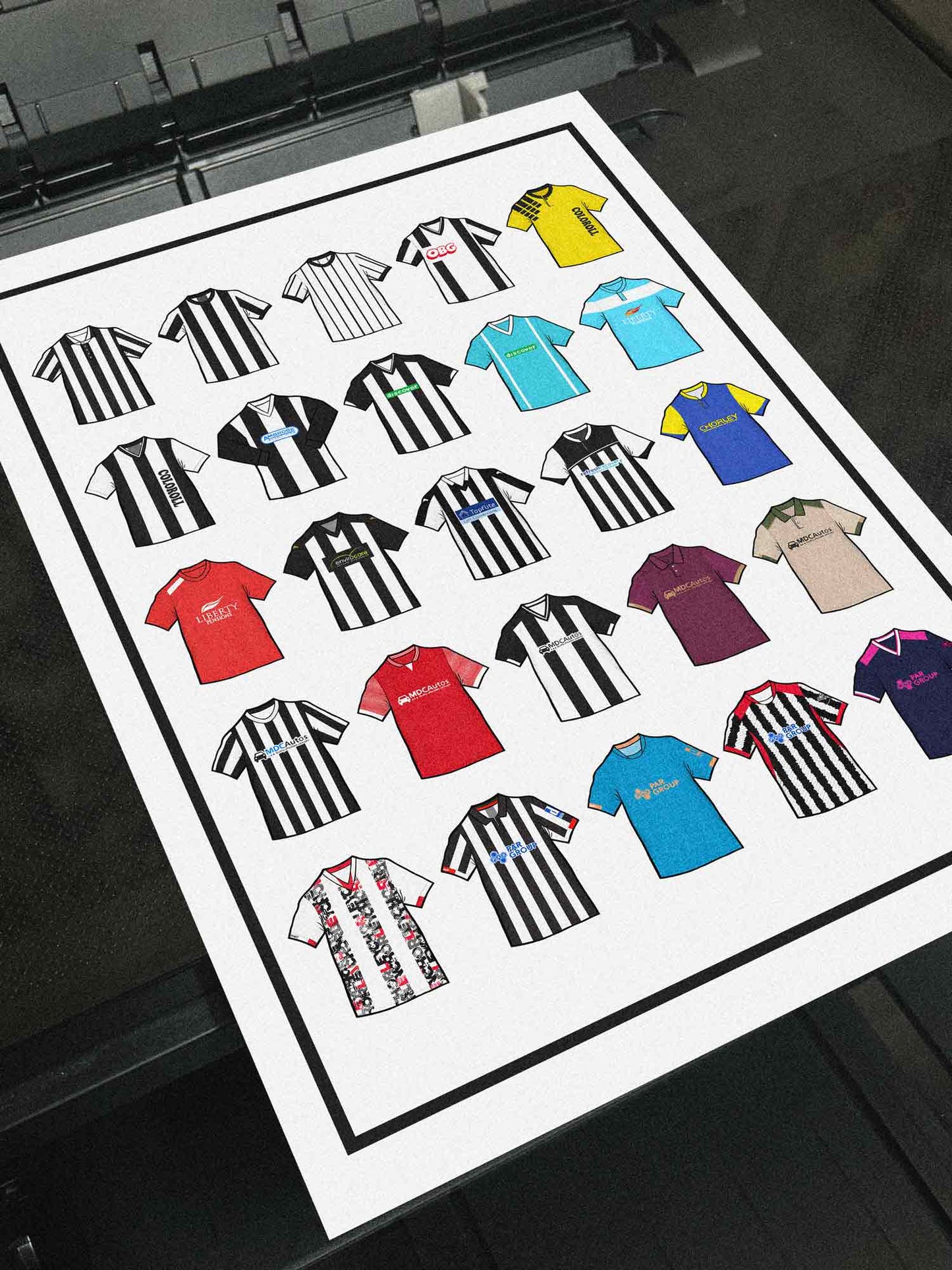 Poster artwork inspired by Chorley FC shirts, featuring a stylized design with bold black and white elements. The piece showcases 25 hand-drawn retro shirts, incorporating vintage jersey patterns and textures that reflect the proud tradition and rich heritage of Chorley Football Club. It blends classic elements with a sharp, contemporary aesthetic that celebrates the enduring spirit of the Magpies and the club’s historic legacy at Victory Park