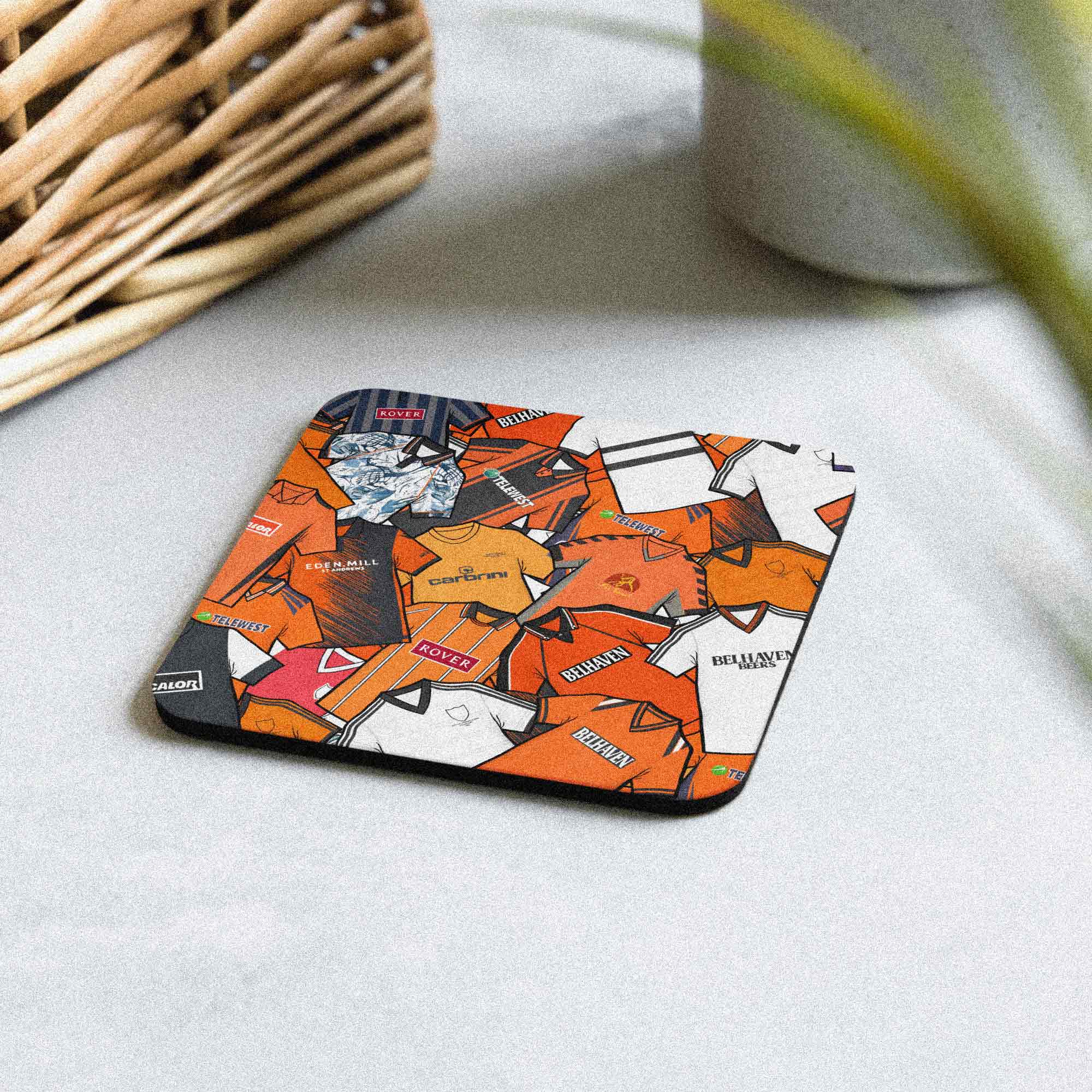 This football coaster is a mashup of the Dundee United shirts of the past, inspired by the classic style of the past. 