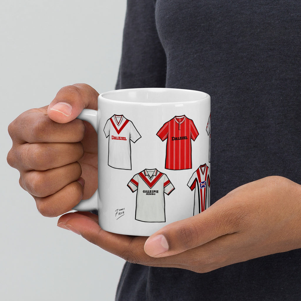 High-quality mug inspired by the famous historical classic football jerseys of Airdrieonians FC. This design pays tribute to iconic kits worn throughout the club’s proud history, celebrating one of Scotland’s most storied football clubs.
Inspired by classic Airdrieonians football kits, colours, and heritage — this is a unique fan-made piece created to honour the legacy of The Diamonds.
This product is unofficial and fan made and is not affiliated with any club or brand