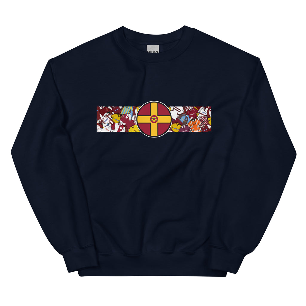 A detailed view of the Northampton Town FC retro sweatshirt featuring a bold Northamptonshire flag and a vintage collage of classic Cobblers football shirts on the front. This stylish design celebrates the proud history and heritage of Northampton Town Football Club. Perfect for match days, casual wear, or as a thoughtful gift for any supporter, this sweatshirt captures true Cobblers pride and timeless football spirit in a classic retro look.