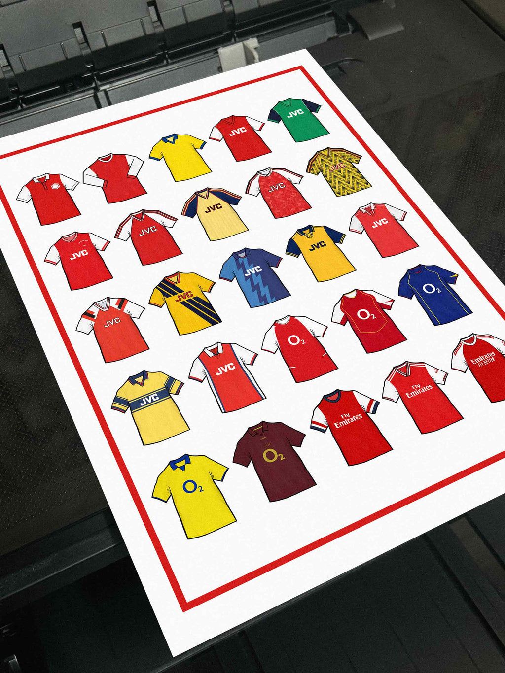 Arsenal FC Retro Shirts Art Print featuring 25 hand-drawn classic football shirts, highlighting the club’s most iconic kits through the years. A tribute to the Gunners’ proud history and legendary footballing legacy, captured in detailed, vintage-inspired illustrations