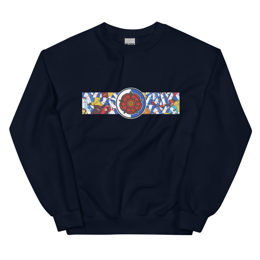 Blackburn Rovers FC-inspired retro football sweatshirt featuring a bold central Lancashire rose design. This unisex pullover blends vintage kit aesthetics with warm, everyday comfort—perfect for chilly match days, pub nights, or relaxed casual wear. The design pays homage to classic Rovers jerseys and proudly celebrates Blackburn’s rich football heritage and Lancashire roots. A perfect gift or wardrobe essential for dedicated fans who appreciate retro football culture and hometown pride