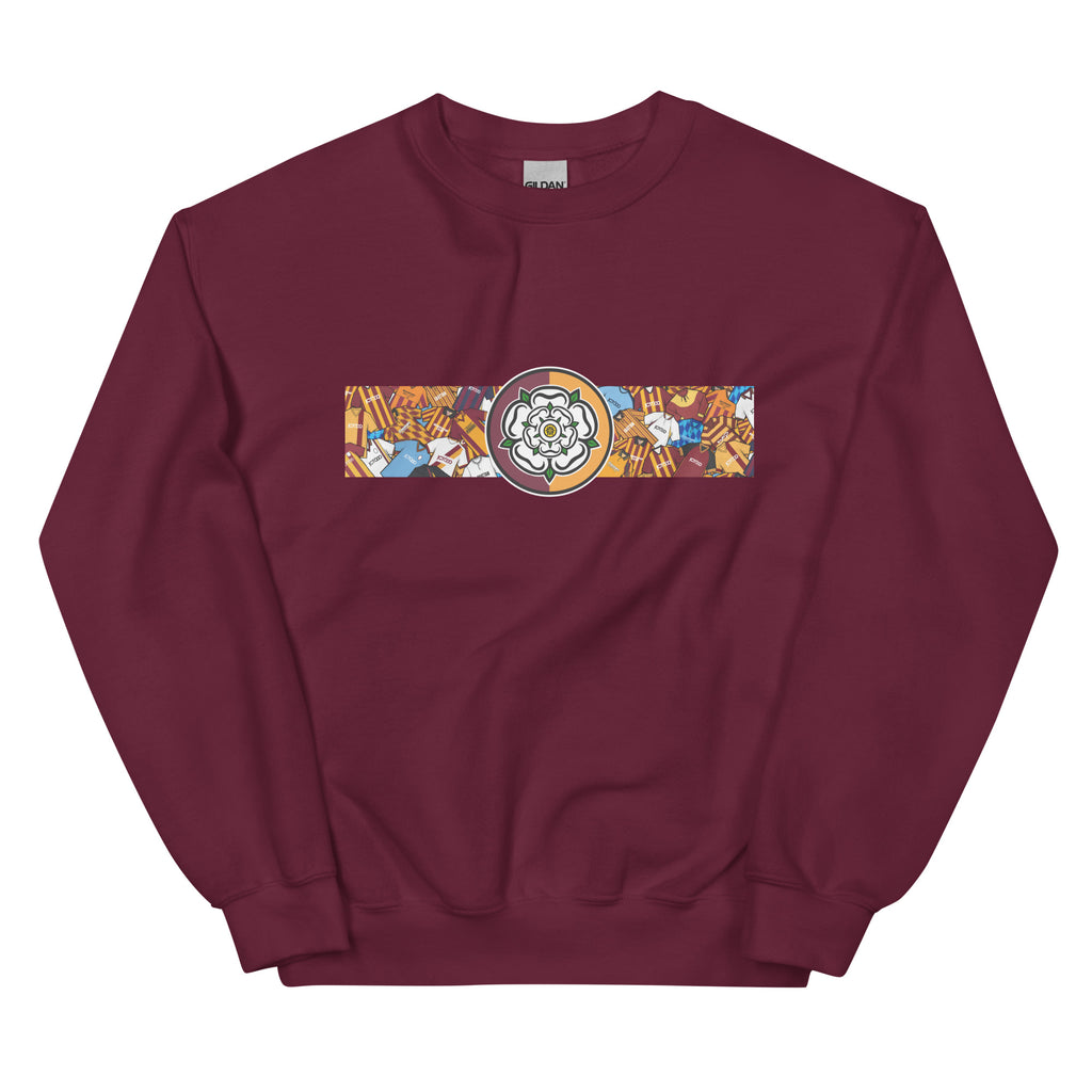 Bradford City FC-inspired retro football sweatshirt featuring a bold central Yorkshire rose design. This unisex pullover combines vintage kit aesthetics with warm, everyday comfort—perfect for chilly match days, pub nights, or casual wear. The design pays tribute to classic Bantams jerseys and proudly reflects Bradford’s rich football heritage and Yorkshire identity. A great gift or wardrobe staple for loyal fans who love retro football culture and their hometown pride