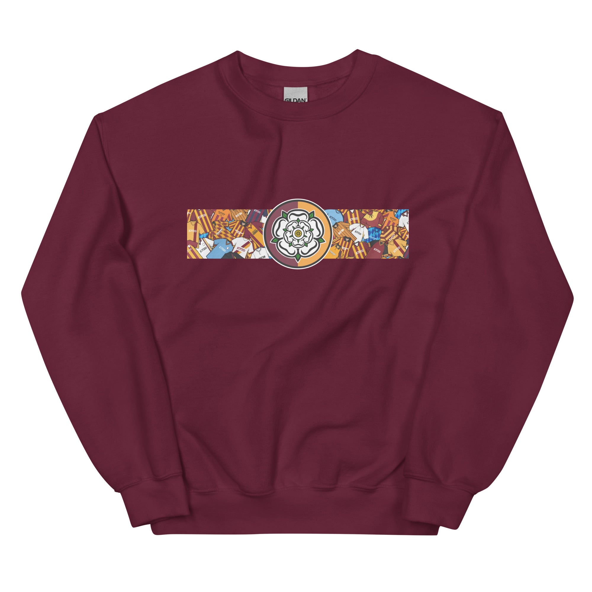 Bradford City FC-inspired retro football sweatshirt featuring a bold central Yorkshire rose design. This unisex pullover combines vintage kit aesthetics with warm, everyday comfort—perfect for chilly match days, pub nights, or casual wear. The design pays tribute to classic Bantams jerseys and proudly reflects Bradford’s rich football heritage and Yorkshire identity. A great gift or wardrobe staple for loyal fans who love retro football culture and their hometown pride
