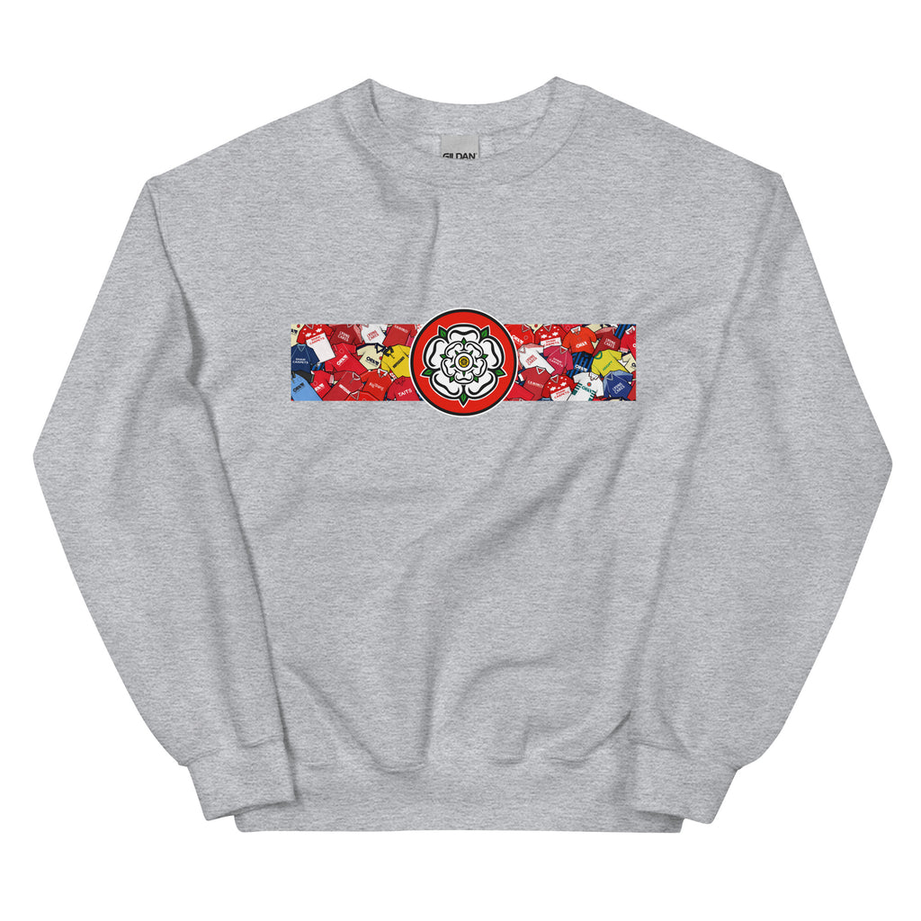 Celebrate your Tykes pride with this Barnsley FC–inspired retro football sweatshirt, featuring a bold central white rose of Yorkshire design. This unisex pullover blends vintage kit aesthetics with cosy, everyday comfort—perfect for chilly match days at Oakwell, pub nights, or laid-back casual wear. The design pays homage to classic Barnsley jerseys while proudly honouring the club’s rich history and Yorkshire roots. A must-have gift or wardrobe essential for loyal supporters