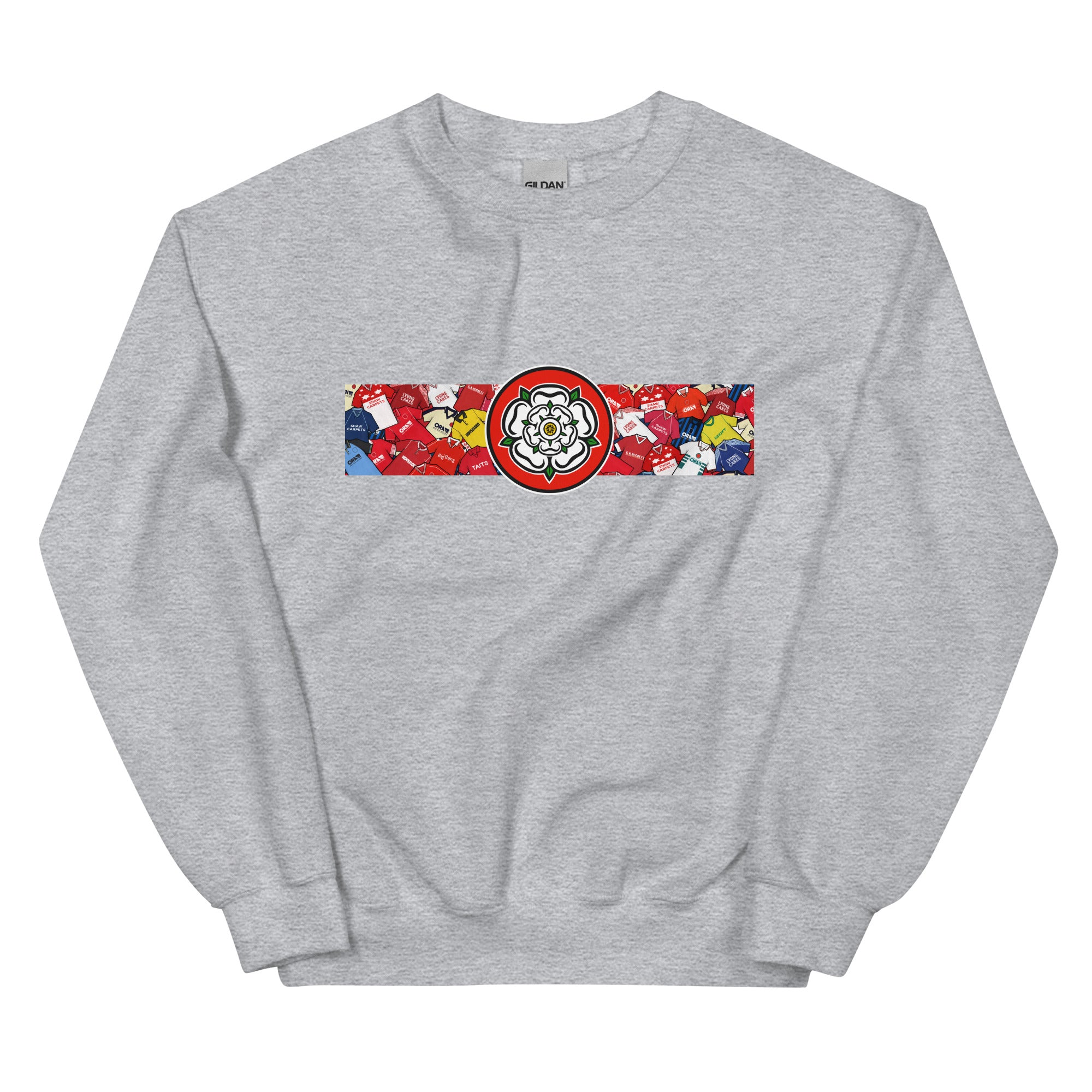 Celebrate your Tykes pride with this Barnsley FC–inspired retro football sweatshirt, featuring a bold central white rose of Yorkshire design. This unisex pullover blends vintage kit aesthetics with cosy, everyday comfort—perfect for chilly match days at Oakwell, pub nights, or laid-back casual wear. The design pays homage to classic Barnsley jerseys while proudly honouring the club’s rich history and Yorkshire roots. A must-have gift or wardrobe essential for loyal supporters