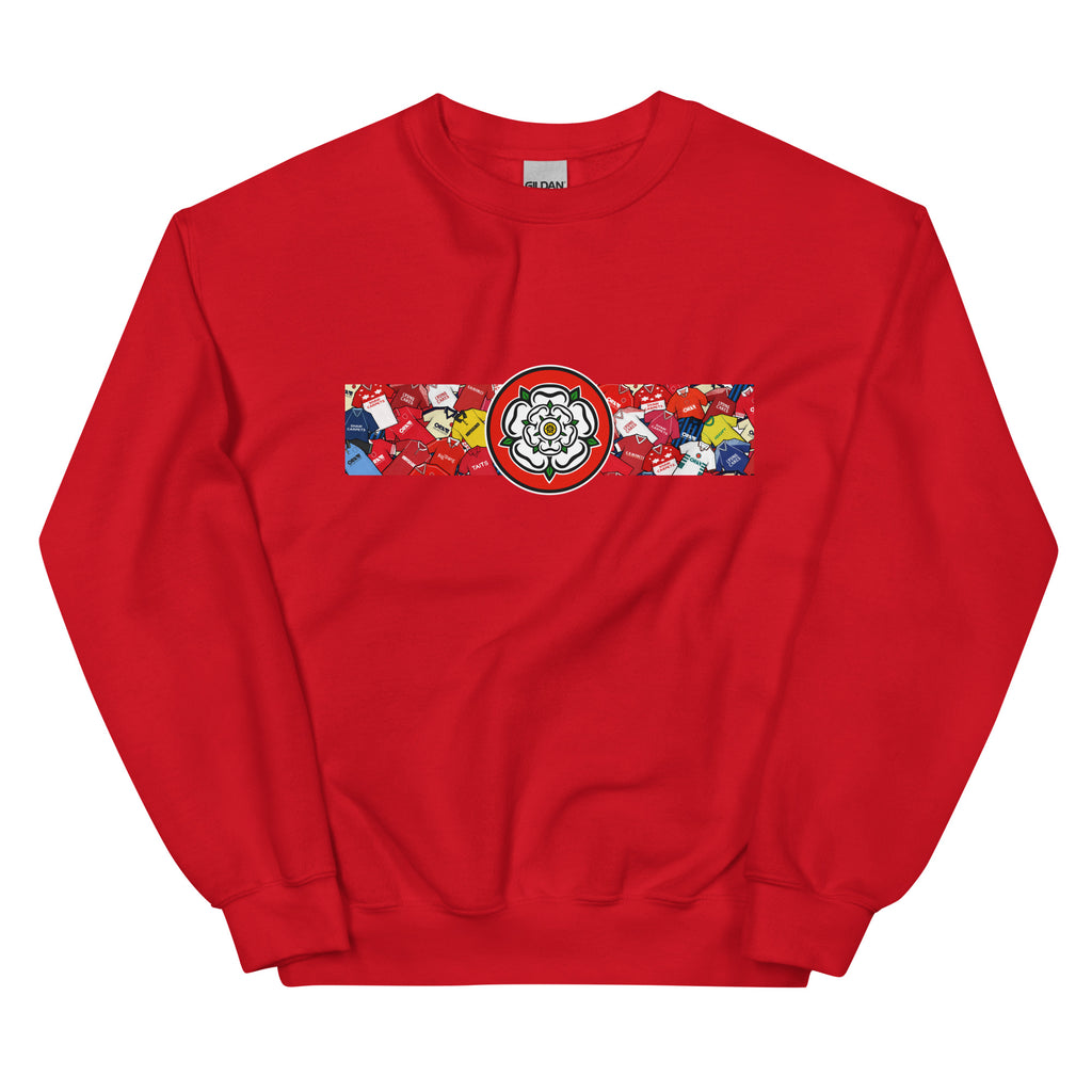 Celebrate your Tykes pride with this Barnsley FC–inspired retro football sweatshirt, featuring a bold central white rose of Yorkshire design. This unisex pullover blends vintage kit aesthetics with cosy, everyday comfort—perfect for chilly match days at Oakwell, pub nights, or laid-back casual wear. The design pays homage to classic Barnsley jerseys while proudly honouring the club’s rich history and Yorkshire roots. A must-have gift or wardrobe essential for loyal supporters