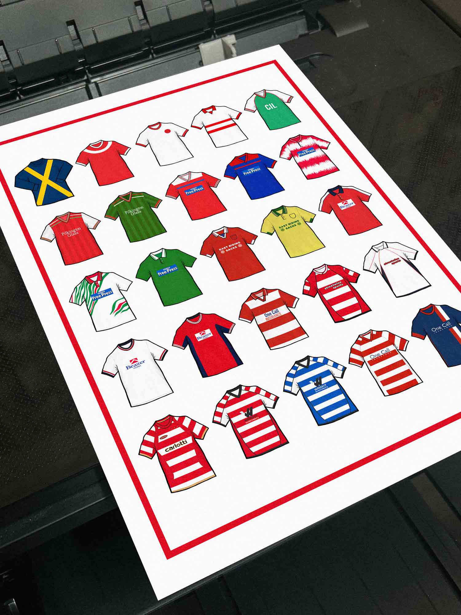 Doncaster Rovers Retro Shirts Art Print featuring 25 hand-drawn classic football shirts, showcasing the club’s most iconic kits through the years. A celebration of the Rovers’ proud history and evolving style, captured in detailed, vintage-inspired illustrations