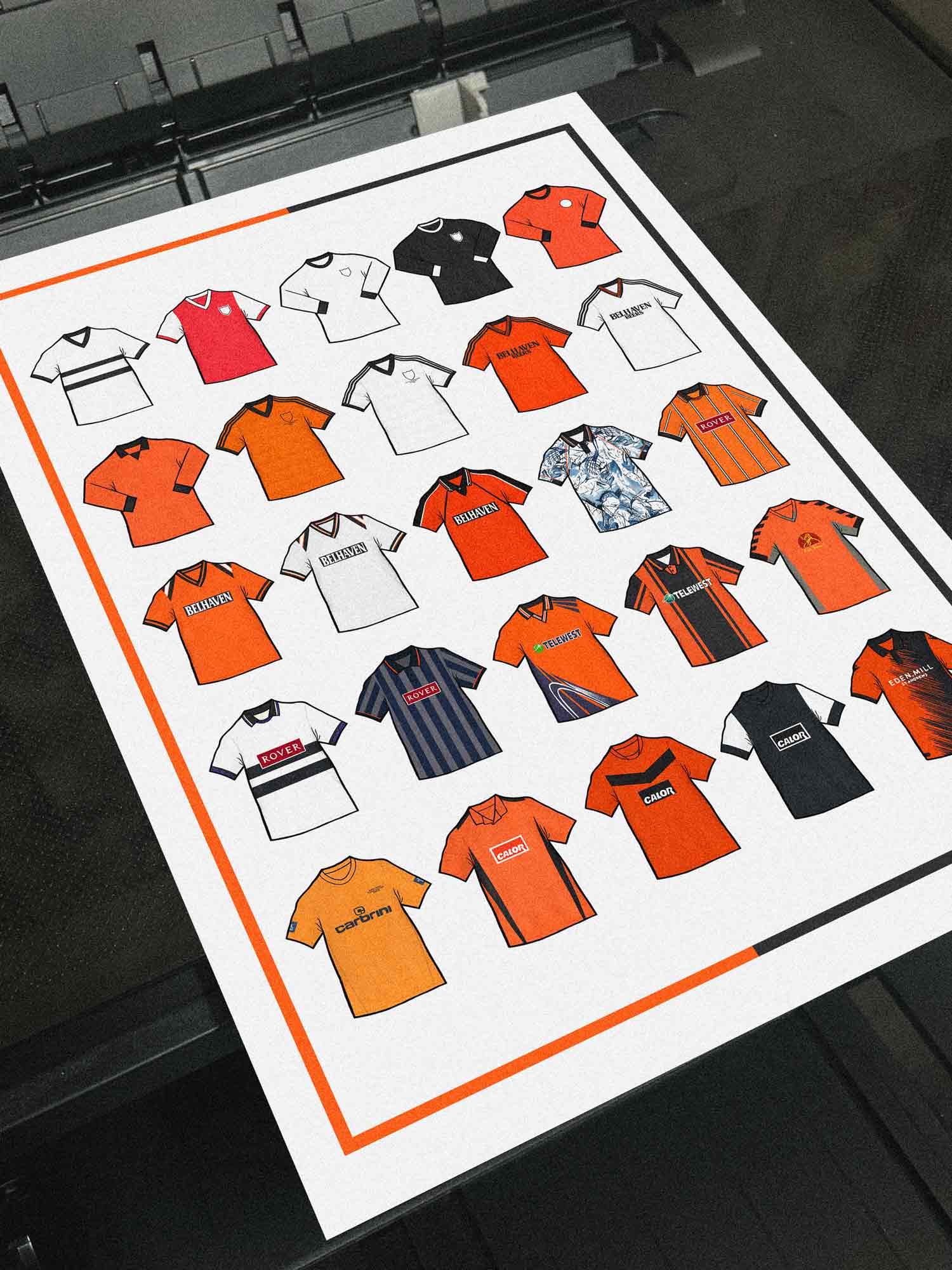 Poster artwork inspired by Dundee United FC shirts, featuring a stylized design with bold tangerine, black, and white elements. The piece showcases 25 hand-drawn retro shirts, incorporating vintage jersey patterns and textures that capture the proud tradition and rich heritage of Dundee United Football Club. Blending classic details with a sharp, contemporary aesthetic, it celebrates the enduring spirit of the Terrors and the club’s historic legacy at Tannadice Park.