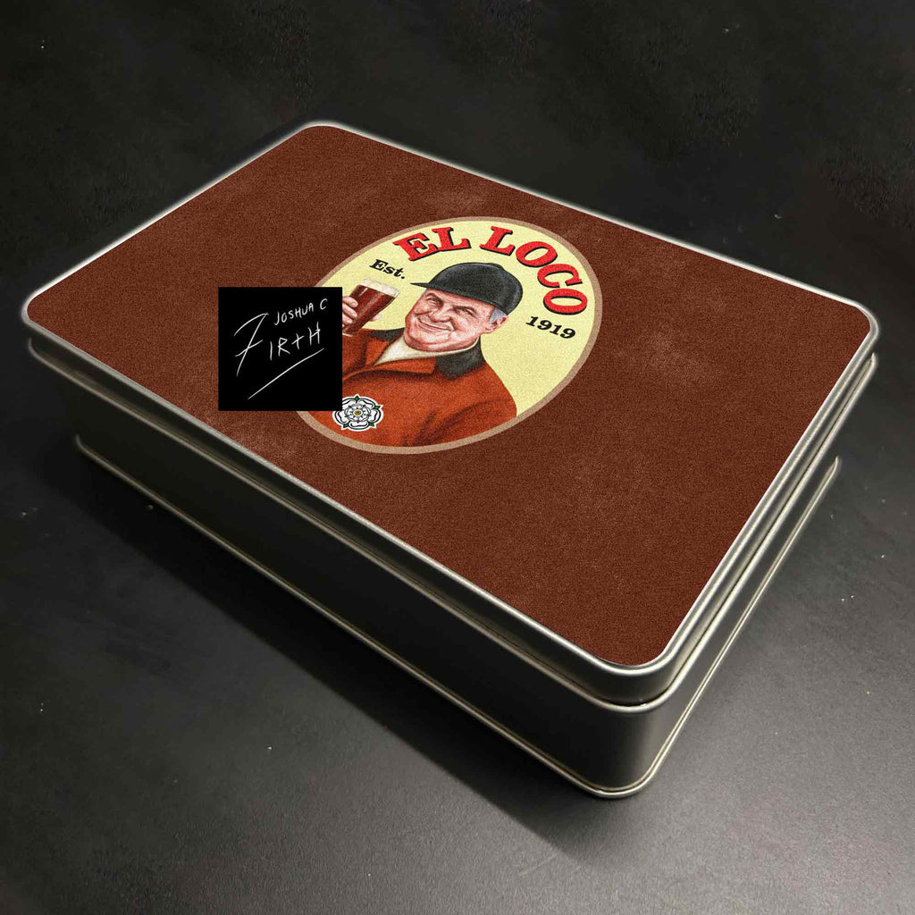 Retro Marcelo Bielsa “El Loco” Leeds United inspired artwork on a metal biscuit and sweets tin. A unique vintage-style gift for Leeds fans and football collectors. ⚽