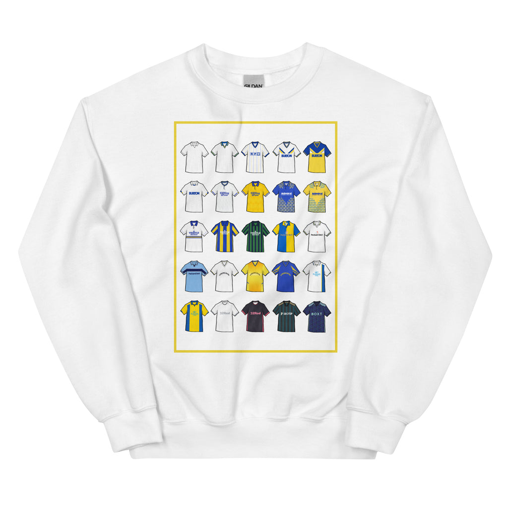 Retro-style Leeds United inspired sweatshirt made from a 50/50 cotton-polyester blend, featuring a pre-shrunk classic fit with soft air-jet spun yarn. Includes a 1x1 athletic rib knit collar with spandex and durable double-needle stitching on the collar, shoulders, armholes, cuffs, and hem.