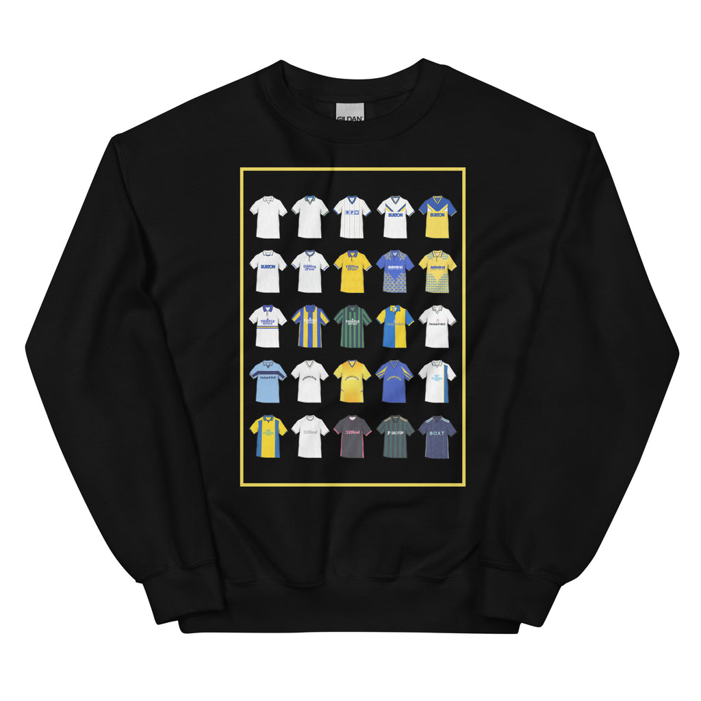 Retro-style Leeds United inspired sweatshirt made from a 50/50 cotton-polyester blend, featuring a pre-shrunk classic fit with soft air-jet spun yarn. Includes a 1x1 athletic rib knit collar with spandex and durable double-needle stitching on the collar, shoulders, armholes, cuffs, and hem.
