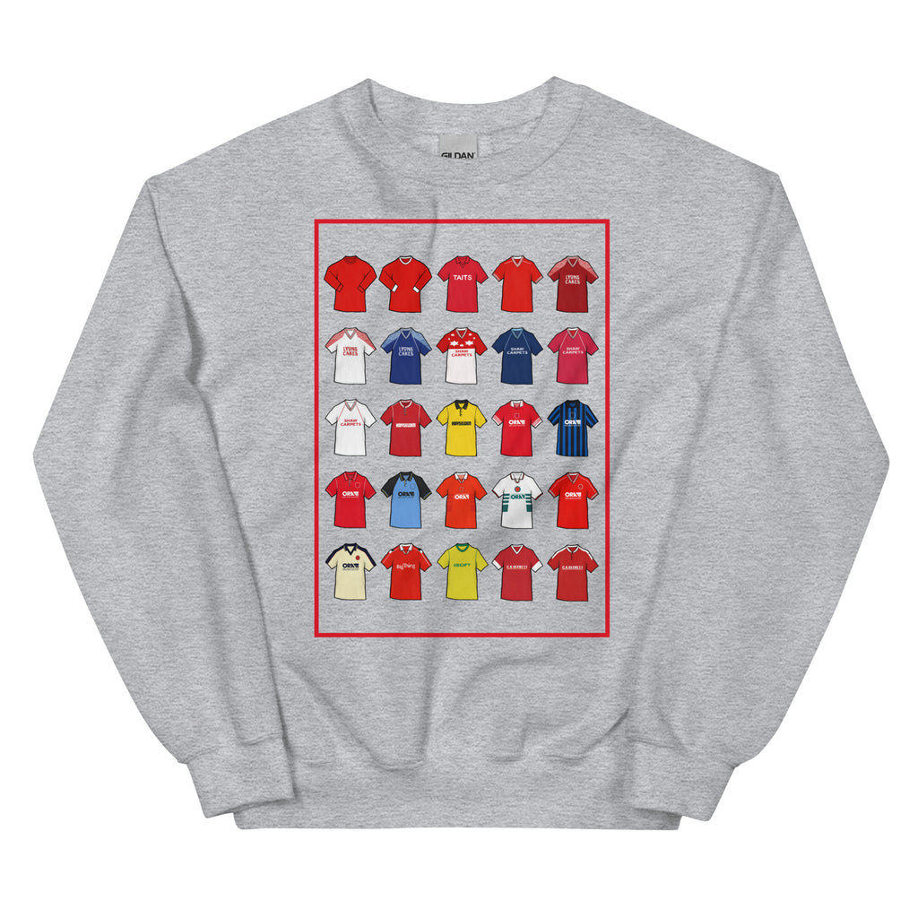 Retro-style Barnsley FC inspired sweatshirt made from a 50/50 cotton-polyester blend, featuring a pre-shrunk classic fit with soft air-jet spun yarn. Includes a 1x1 athletic rib knit collar with spandex and durable double-needle stitching on the collar, shoulders, armholes, cuffs, and hem