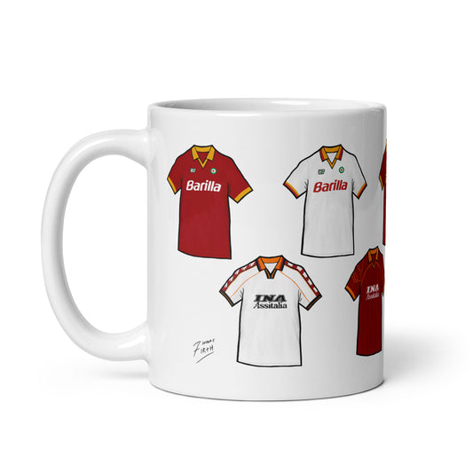 A white ceramic drinks mug featuring colorful artwork inspired by the retro shirts of AS Roma, with a bold and vintage design showcasing the team's iconic colours