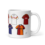 A white ceramic drinks mug featuring colorful artwork inspired by the retro shirts of AS Roma, with a bold and vintage design showcasing the team's iconic colours