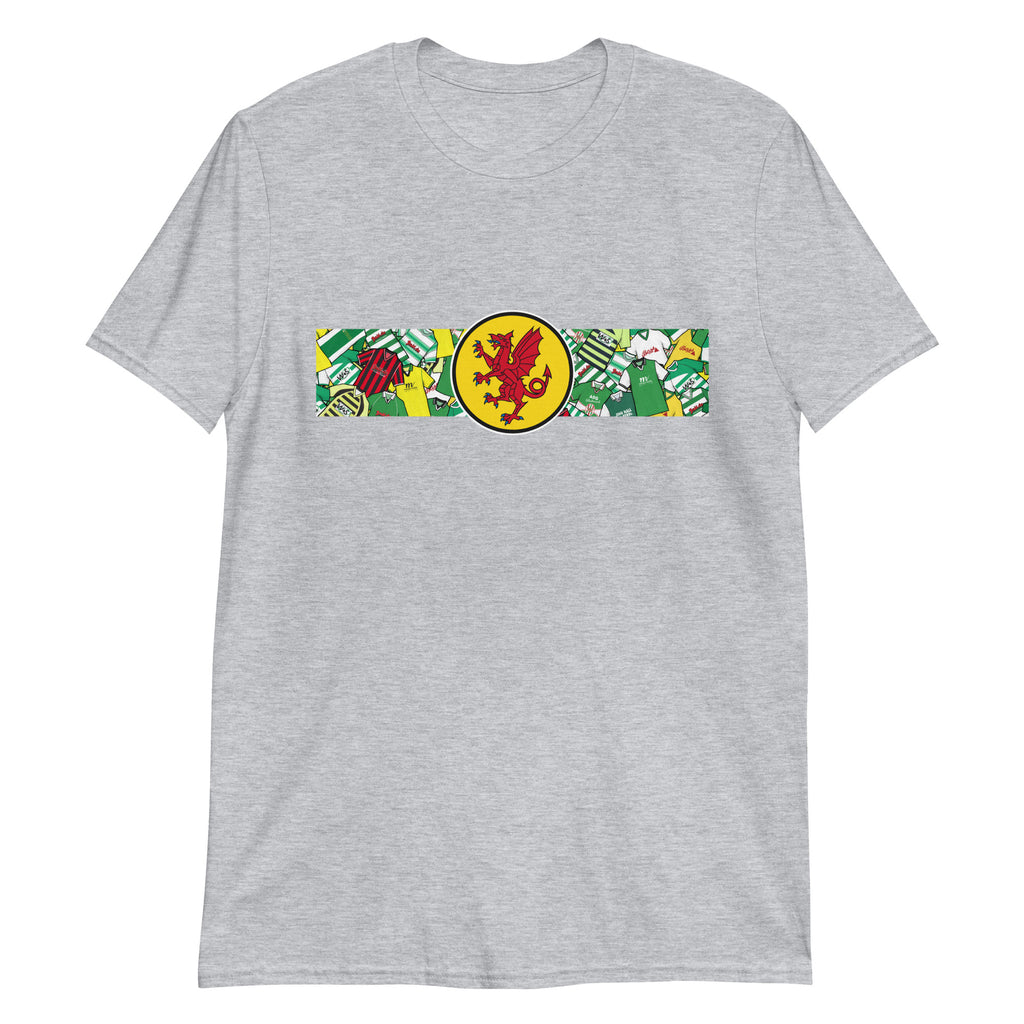 Show your Glovers pride with this Yeovil Town FC T-shirt, perfect for fans of Somerset football. Featuring a bold retro collage of Yeovil Town’s iconic classic shirts, this vintage-style T-shirt is ideal for match days, casual wear, or as a Yeovil Town football gift. Celebrate the club’s rich heritage, classic green and white style, and timeless Glovers football culture with this must-have Yeovil Town T-shirt for true supporters.