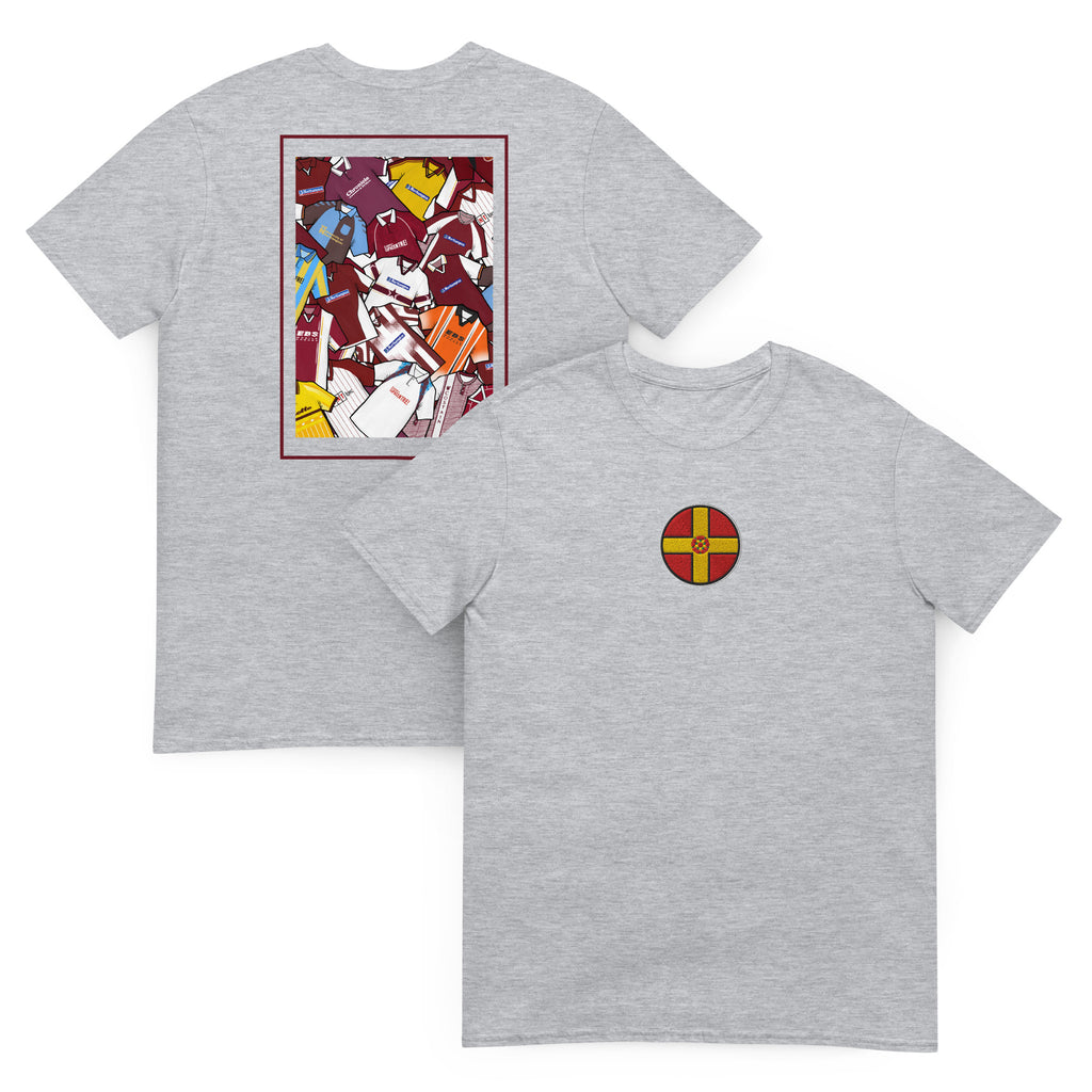 This Northampton Town FC T-shirt features an embroidered Northamptonshire flag on the front and a retro collage of the club’s classic shirts on the back. Designed for Cobblers fans who love vintage football style, it’s perfect for match days, casual wear, or as a Northampton Town football gift. Celebrate the club’s proud heritage and show your Cobblers pride with this must-have retro Northampton Town T-shirt for true supporters.
