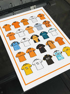 Poster artwork inspired by Wolverhampton Wanderers FC football shirts, featuring a stylized design with gold, black, and white color elements, classic jersey patterns, and the club crest subtly incorporated. The print captures the spirit of Wolves' rich football heritage with a bold, contemporary aesthetic