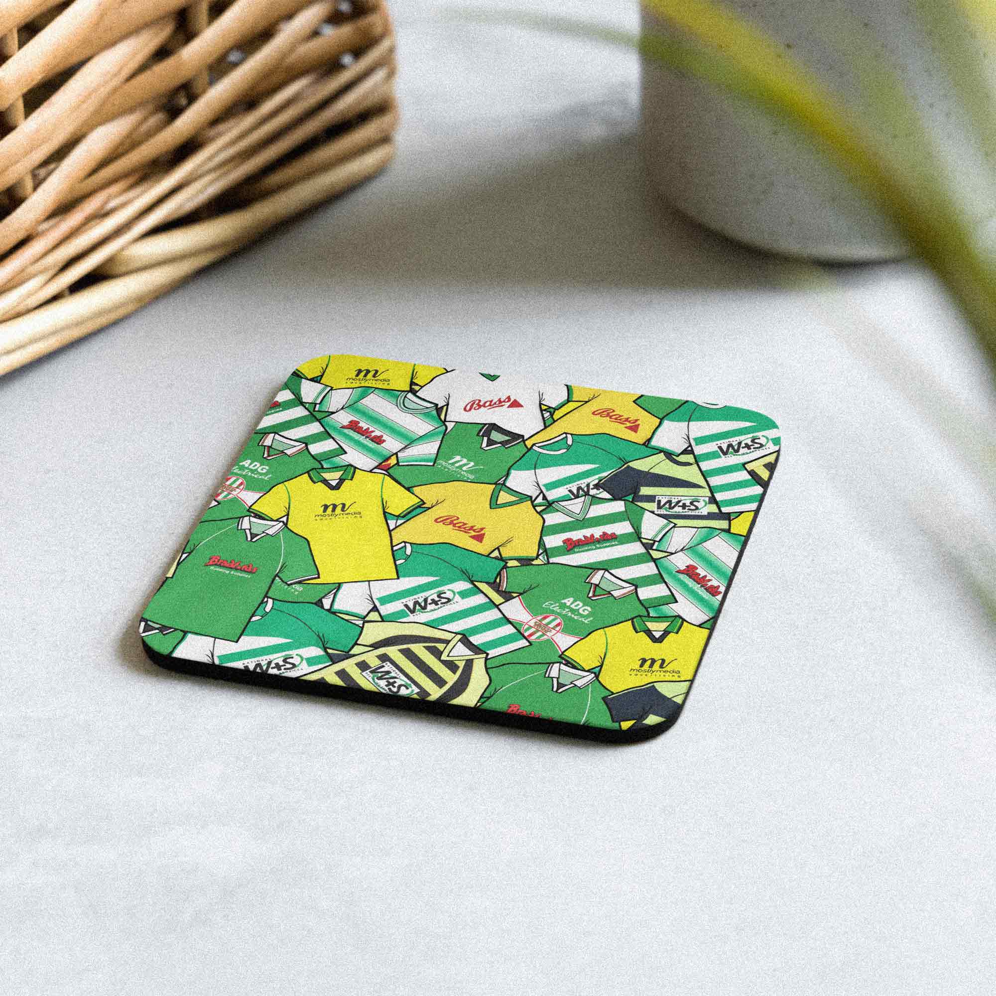 A coaster designed to evoke the iconic Yeovil Town football club shirts of the past, perfect for football enthusiasts, particularly those who support the Glovers. 